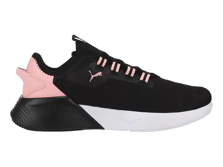 Tenis PUMA Retaliate 2 color negro con detalles en rosa y suela blanca para Mujer.