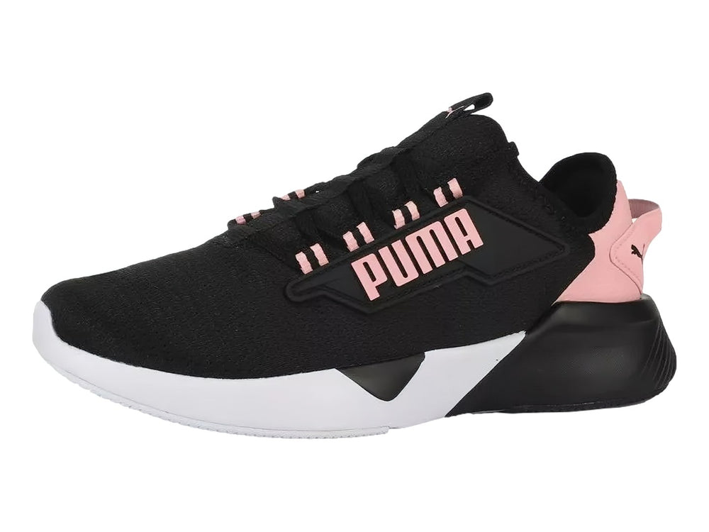 Tenis PUMA Retaliate 2 color negro con detalles en rosa y suela blanca para Mujer.