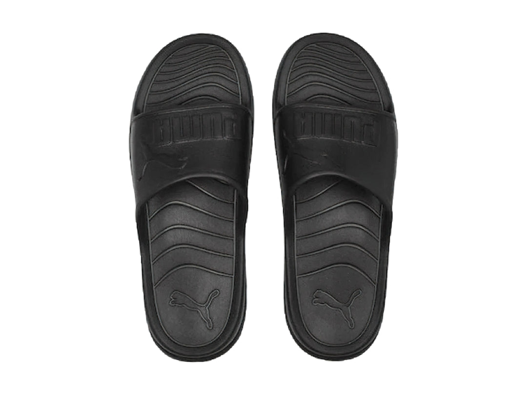 Sandalias PUMA Popcat 20 Injex en color negro sólido con diseño deportivo y correa ancha.