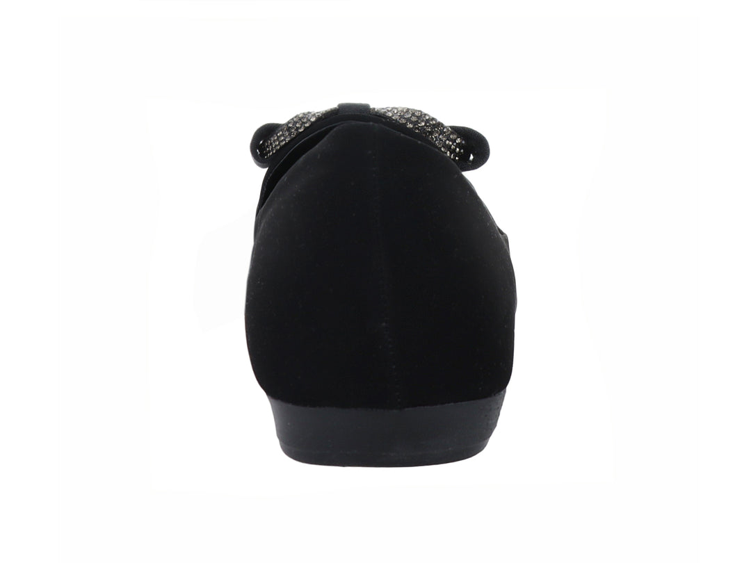 Zapato plano color negro para Mujer con detalle de moño decorativo en la parte frontal.