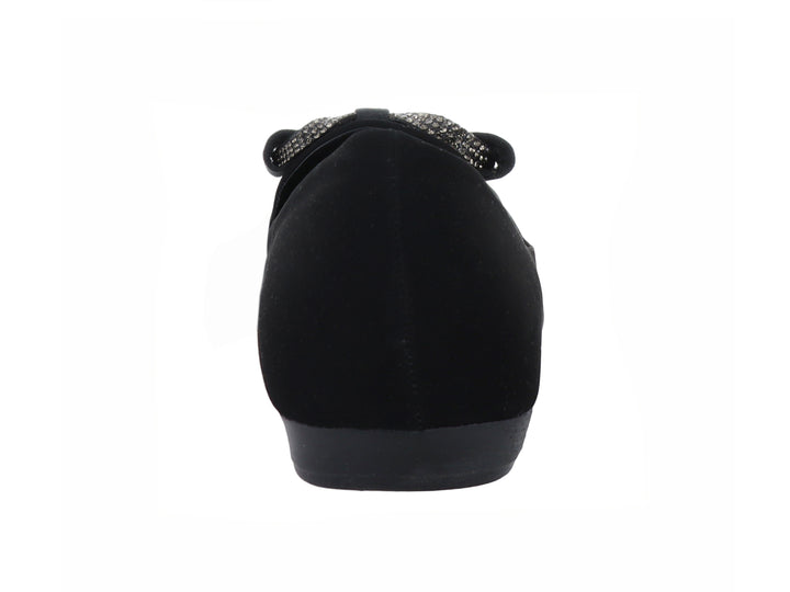 Zapato plano color negro para Mujer con detalle de moño decorativo en la parte frontal.