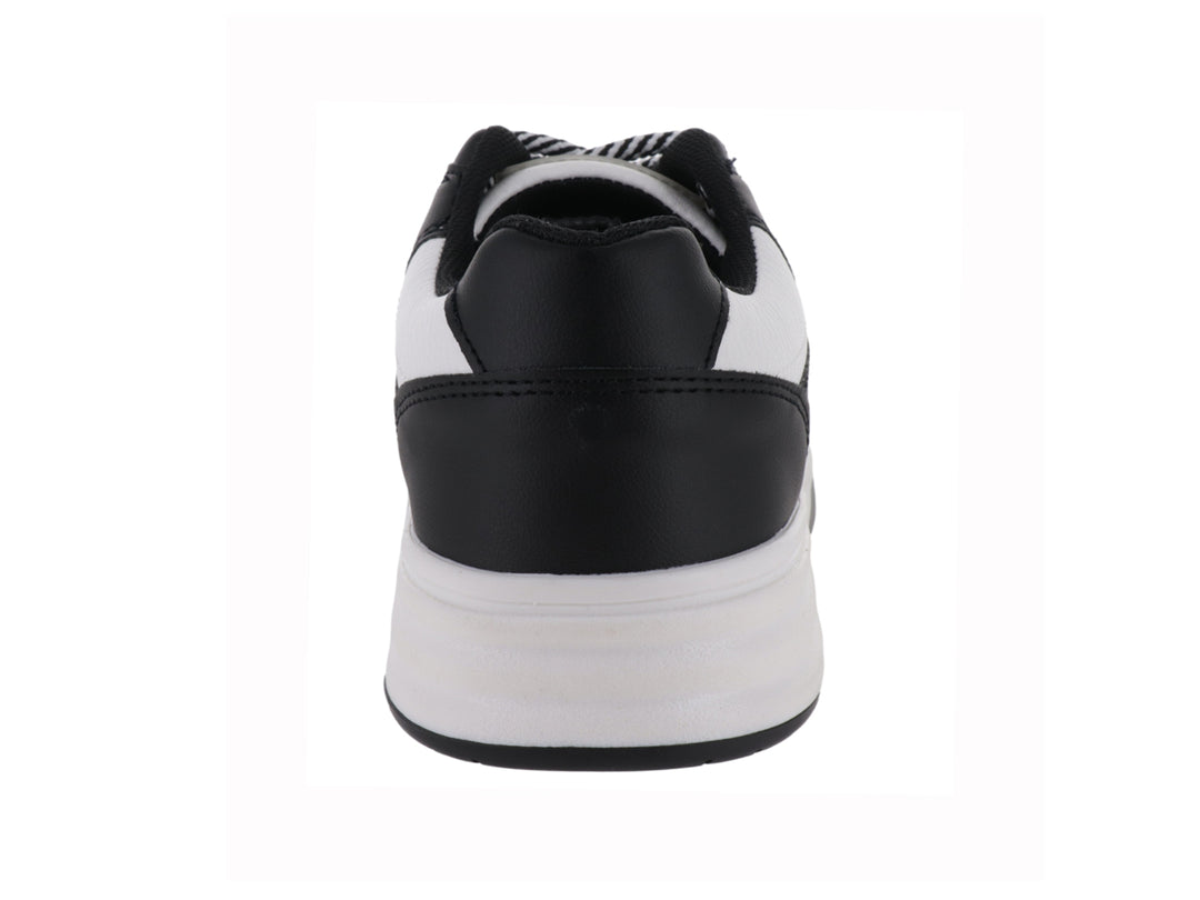 Tenis deportivos Clasben Sidney en color blanco y negro con suela de plataforma y detalle de estrella lateral.