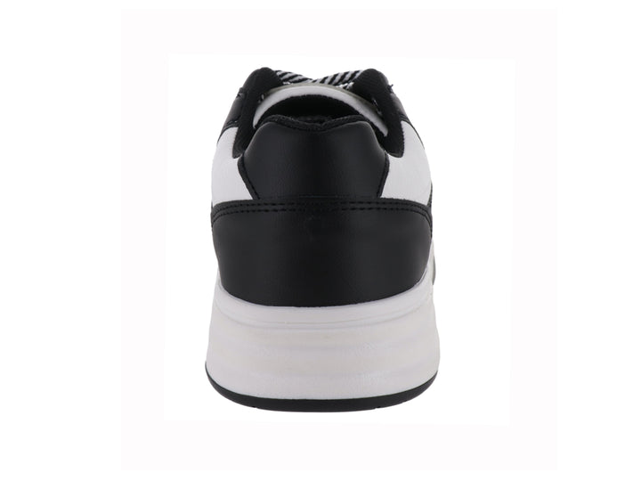 Tenis deportivos Clasben Sidney en color blanco y negro con suela de plataforma y detalle de estrella lateral.