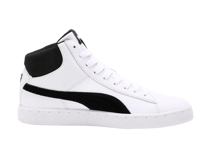 Tenis Puma de corte medio color blanco con franja lateral y cuello en color negro.