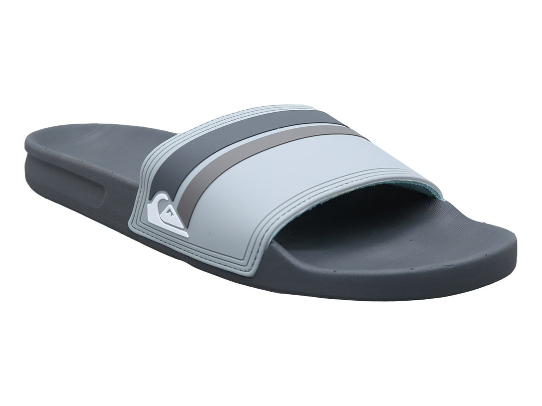 Sandalia slide Quiksilver en color gris con detalles en negro y logotipo blanco en la banda.