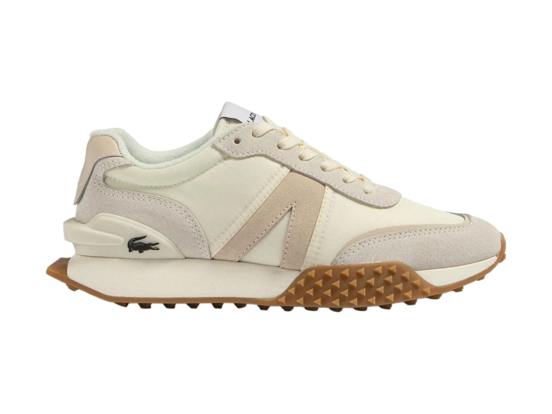 Tenis Lacoste L-Spin Deluxe en tonos blanco roto y beige con suela de goma marrón.