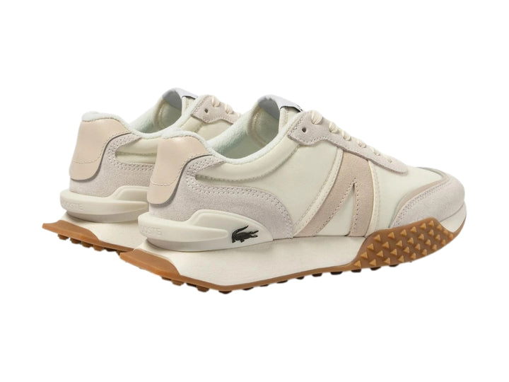 Tenis Lacoste L-Spin Deluxe en tonos blanco roto y beige con suela de goma marrón.