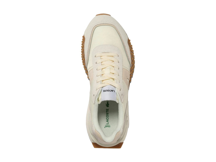 Tenis Lacoste L-Spin Deluxe en tonos blanco roto y beige con suela de goma marrón.