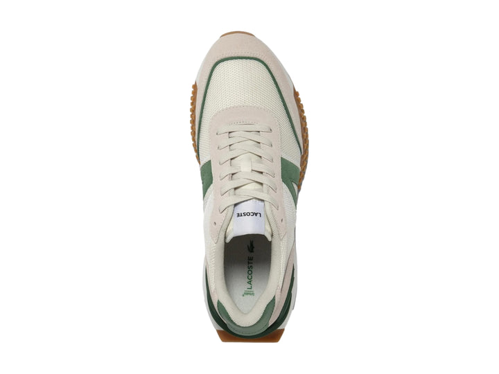 Tenis Lacoste L-Spin Deluxe en color blanco con detalles verdes y suela café dentada.