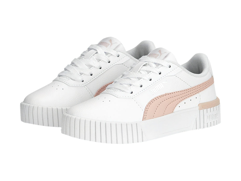 Tenis PUMA Carina 2.0 en color blanco con detalles en rosa pálido y suela blanca ancha.