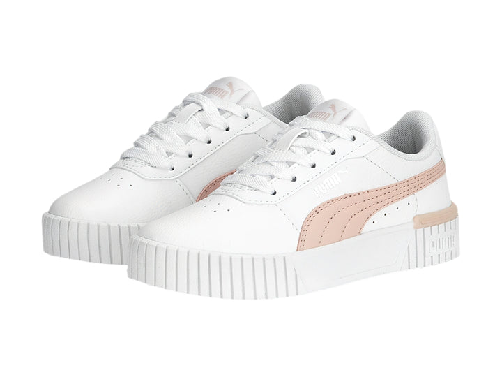 Tenis PUMA Carina 2.0 en color blanco con detalles en rosa pálido y suela blanca ancha.