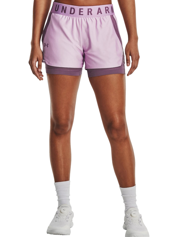 Shorts deportivos Under Armour color morado estilo 2 en 1.