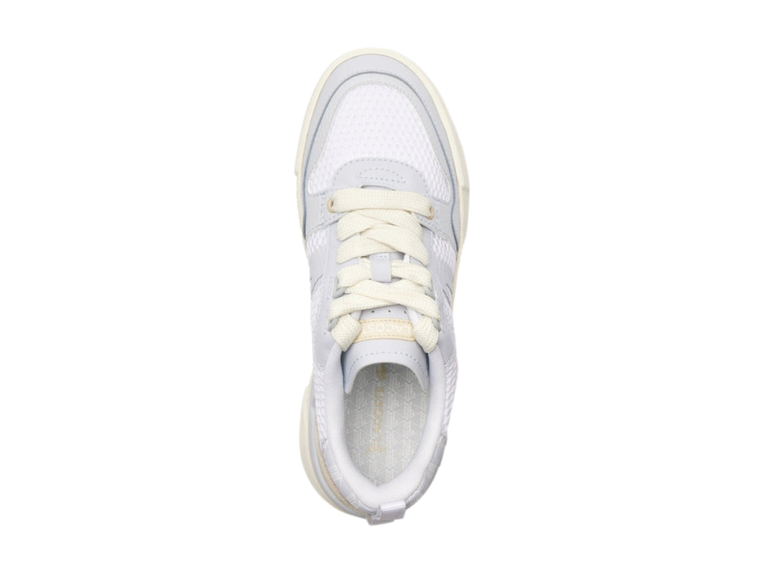 Tenis Lacoste de plataforma en color blanco y turquesa claro con detalles de malla y suela gruesa.