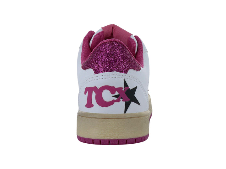 Tenis blancos con detalles de estrella y suela en color rosa brillante y beige.