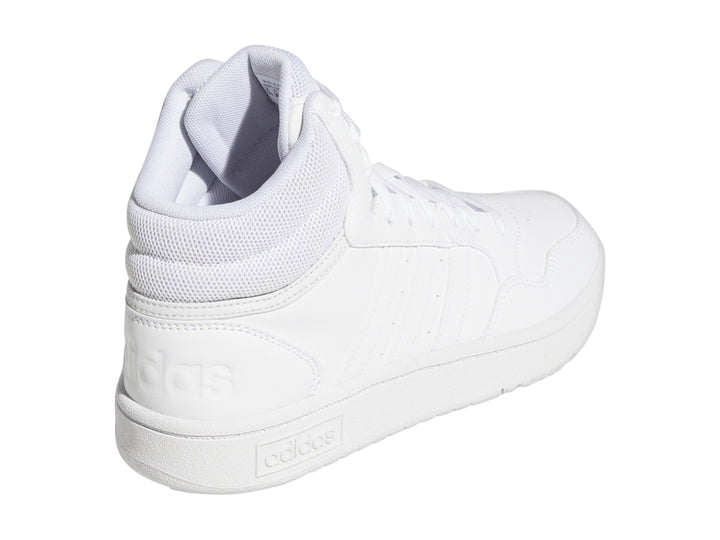 Tenis Adidas Hoops 3.0 Mid de color blanco total con diseño de bota media y suela blanca.