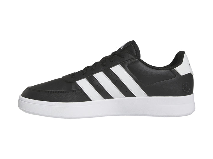 Tenis Adidas Breaknet 2.0 color negro con tres franjas blancas y suela blanca.