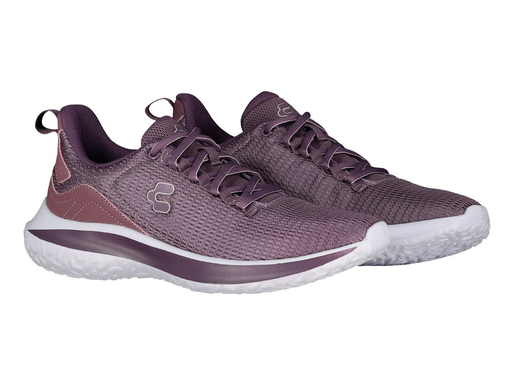 Tenis deportivos Charly en color morado con suela blanca y tejido de malla transpirable.