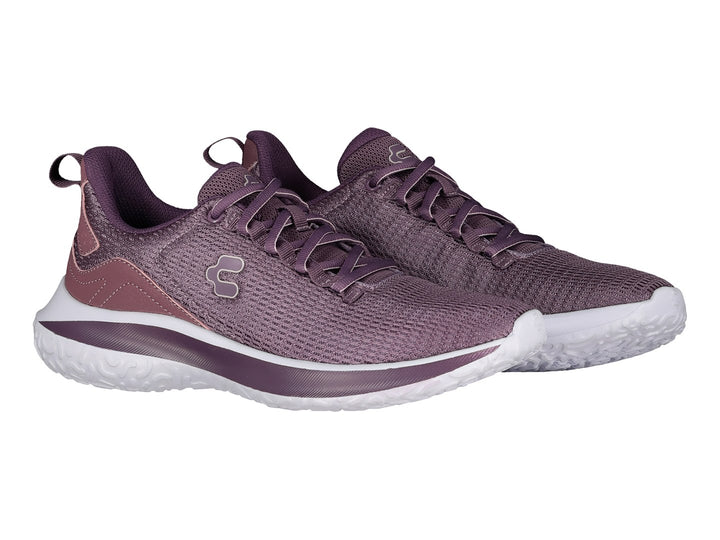 Tenis deportivos Charly en color morado con suela blanca y tejido de malla transpirable.