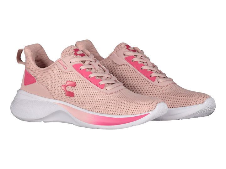 Tenis deportivos Charly color rosa con suela blanca y detalles en rosa fuerte.