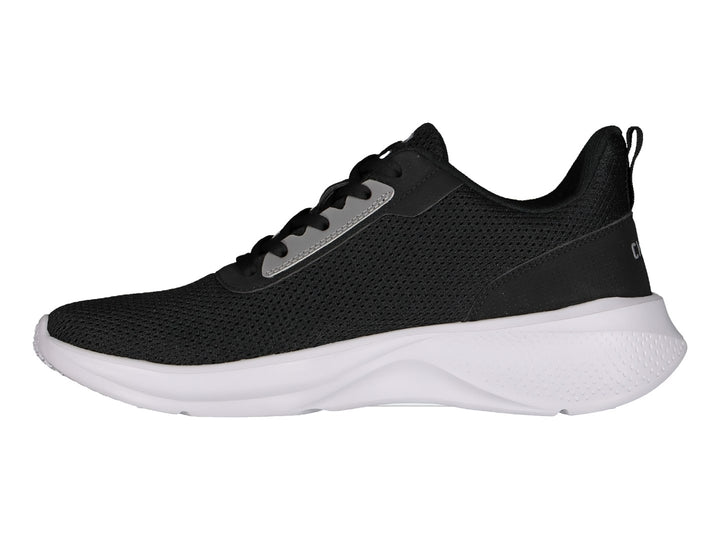 Tenis deportivos Charly en color negro con suela blanca y detalles en gris.