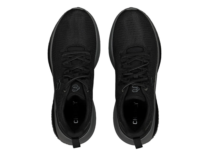 Tenis deportivos Charly color negro con suela gris oxford y tejido de malla.
