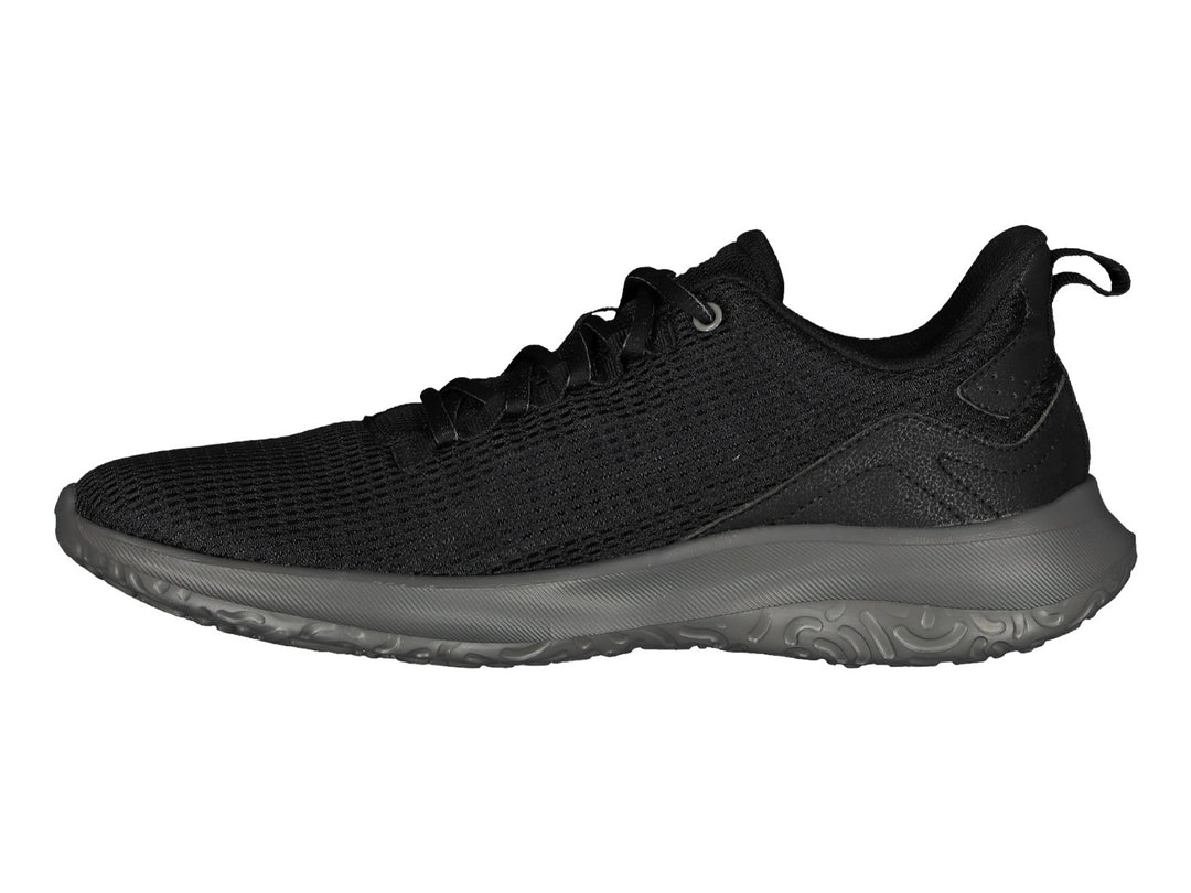 Tenis deportivos Charly color negro con suela gris oxford y tejido de malla.