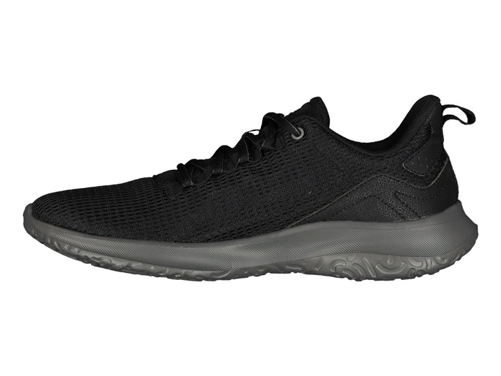 Tenis deportivos Charly color negro con suela gris oxford y tejido de malla.