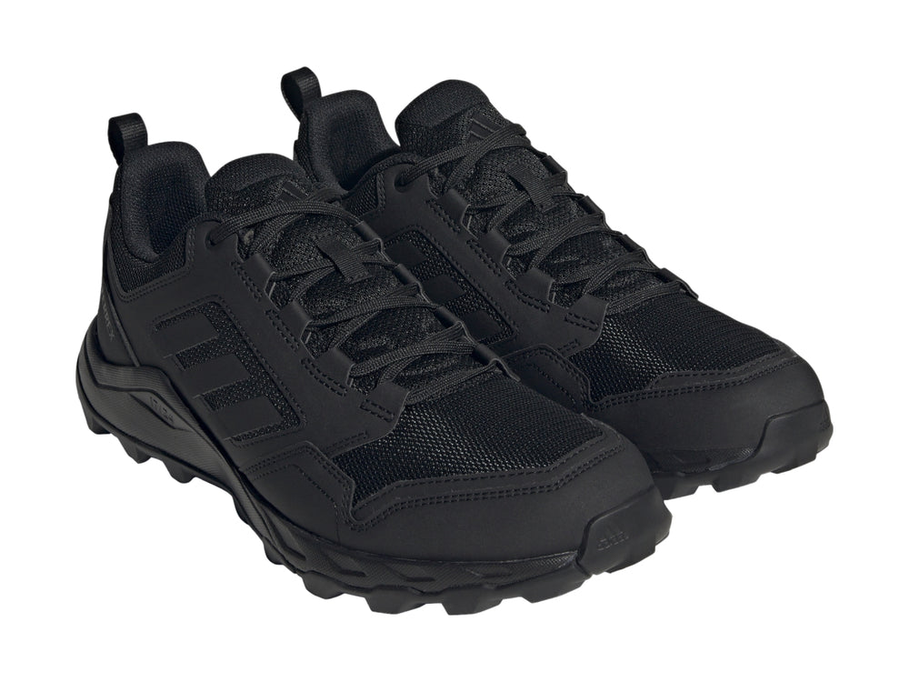 Tenis deportivos Adidas Terrex Tracerocker 2 en color negro, vista lateral sobre fondo blanco.