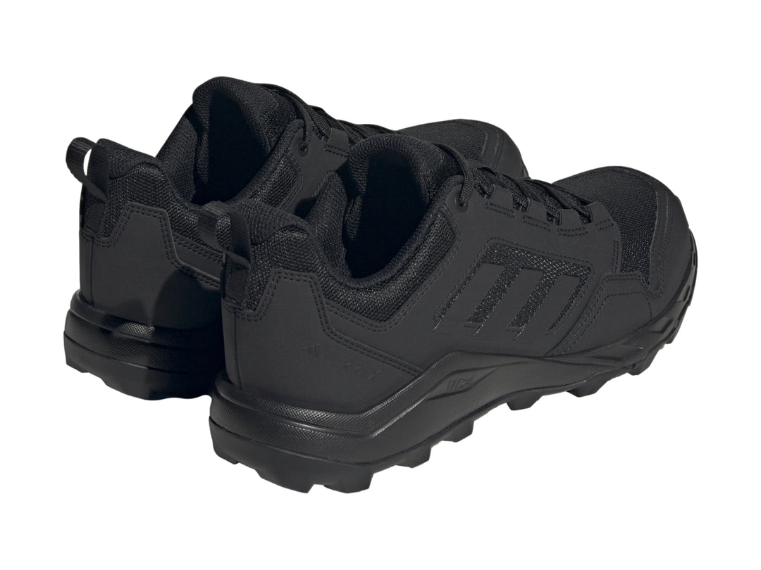 Tenis deportivos Adidas Terrex Tracerocker 2 en color negro, vista lateral sobre fondo blanco.
