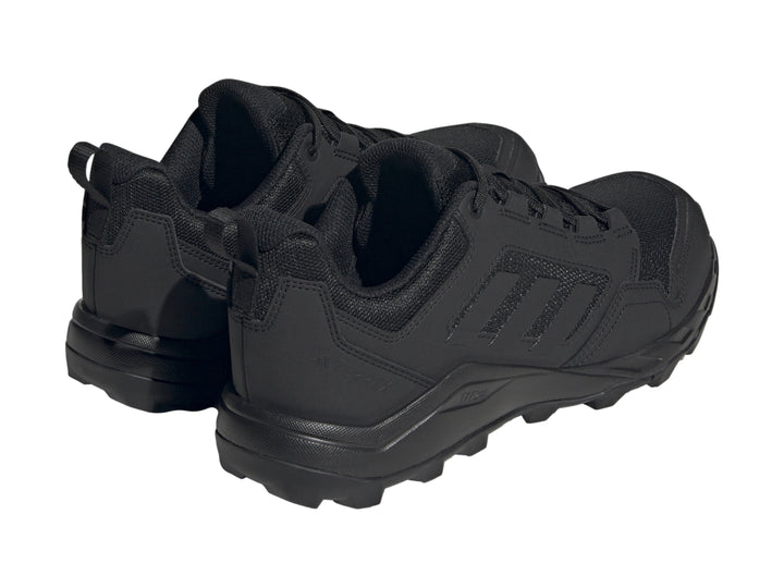 Tenis deportivos Adidas Terrex Tracerocker 2 en color negro, vista lateral sobre fondo blanco.
