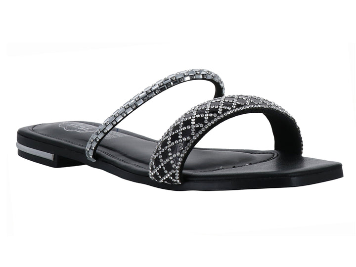 Sandalia plana color negro con tiras decoradas con pedrería brillante.