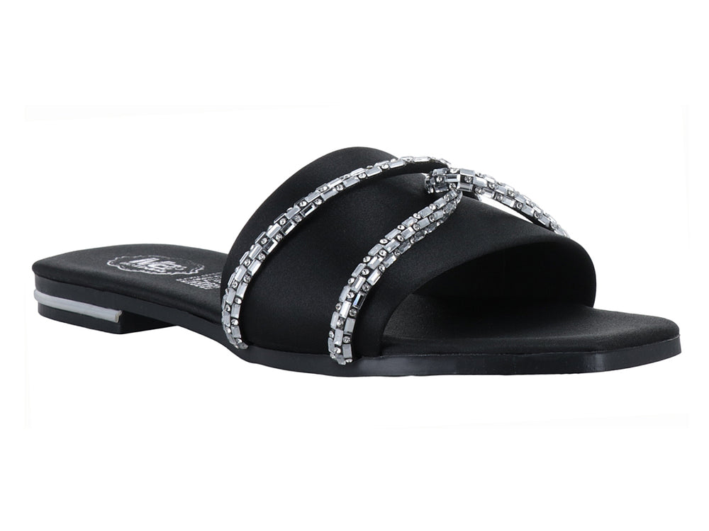 Sandalia negra para mujer con tira ancha decorada con detalles brillantes en color plata y suela plana.