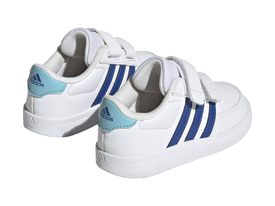Tenis Adidas Breaknet 2.0 CF infantiles en color blanco con tres franjas azules y cierre de velcro.