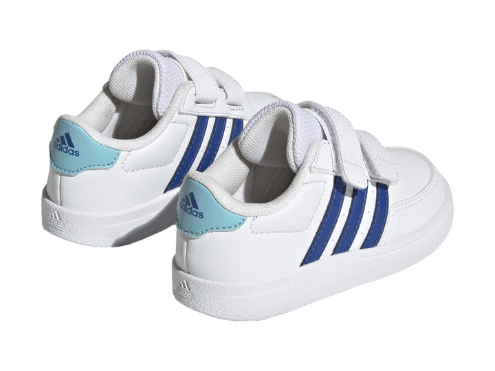 Tenis Adidas Breaknet 2.0 CF infantiles en color blanco con tres franjas azules y cierre de velcro.