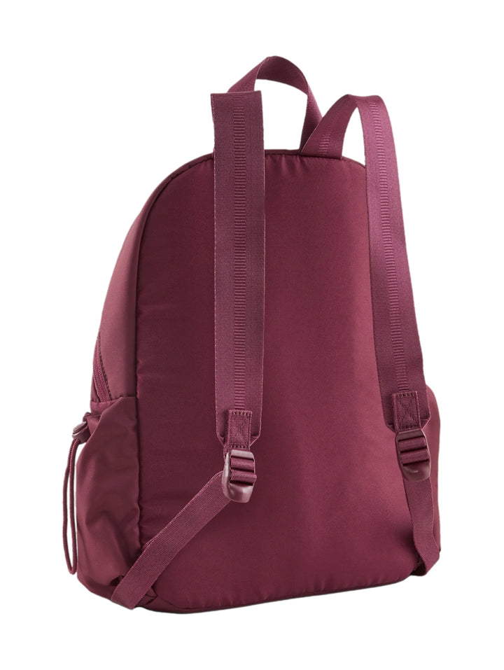 Mochila escolar PUMA color Dark Jasper con compartimento frontal y logo blanco en la parte inferior.