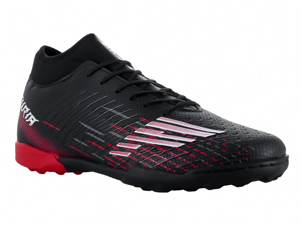 Zapato de fútbol turf marca Furia en color negro con detalles y suela trasera en rojo.