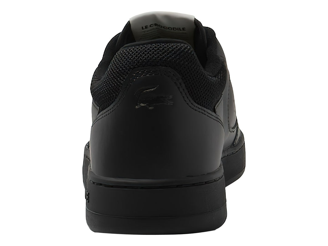 Tenis Lacoste color negro con logotipo de cocodrilo en el lateral y suela a juego.