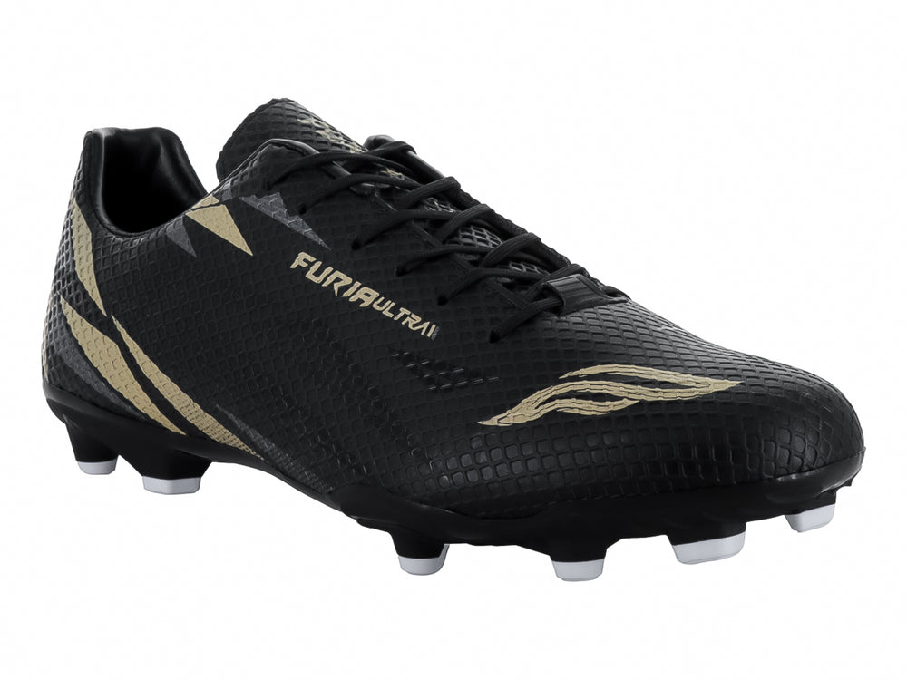 Calzado de fútbol FURIA color negro con detalles dorados y tacos blancos.