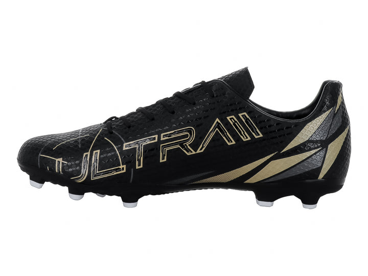 Calzado de fútbol FURIA color negro con detalles dorados y tacos blancos.
