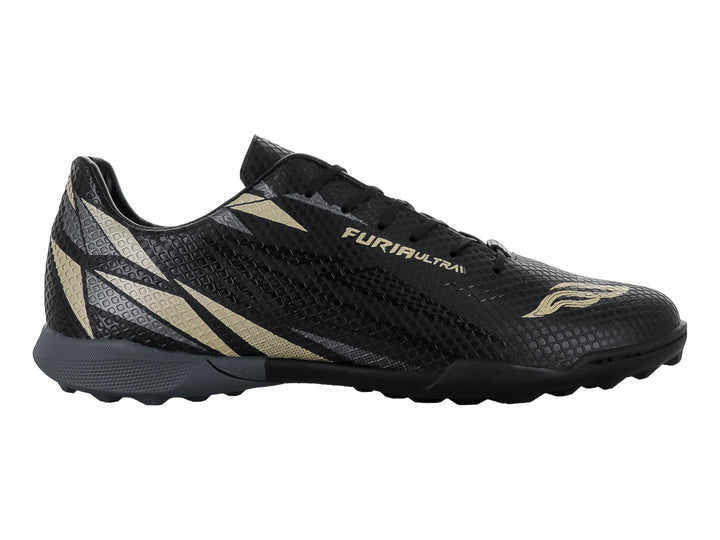 Zapato de fútbol Furia 1023 TF en color negro con detalles en oro y suela para pasto sintético.