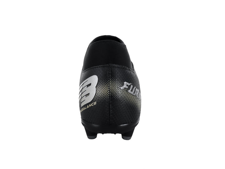 Zapato de fútbol marca Furia en color negro con detalles decorativos en plata y oro, diseño de corte bajo.