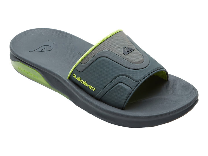 Sandalia Quiksilver color gris con detalles en verde lima, vista lateral.