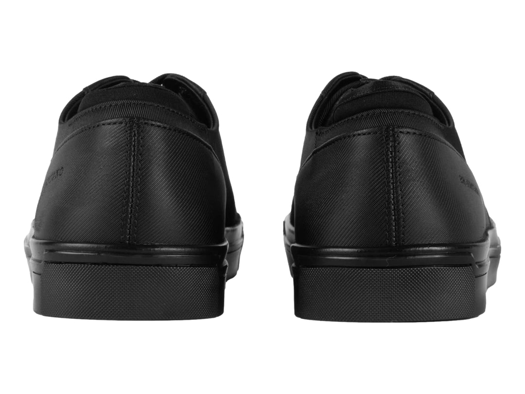 Zapato casual de lona color negro con cordones y suela plana de la marca Brantano.