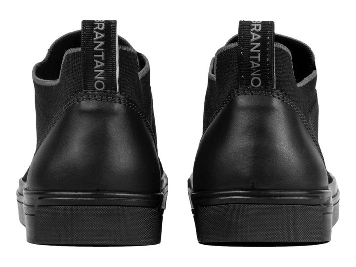 Zapato casual Brantano color negro con cuerpo de tejido y detalles sintéticos, suela plana negra.