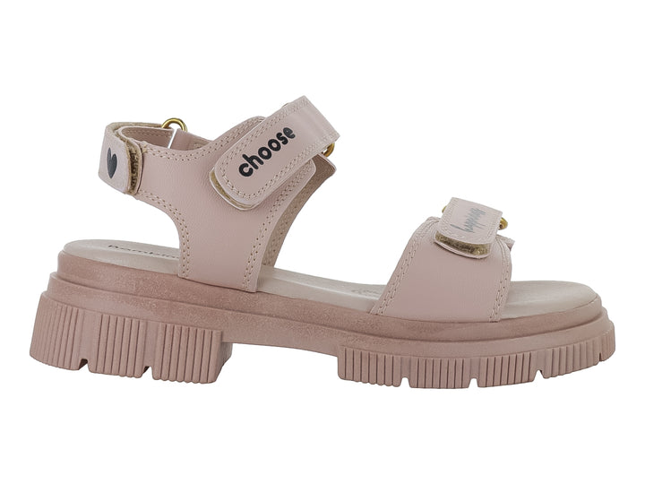 Sandalia color nude para Niña con suela de plataforma dentada y correas con hebilla.