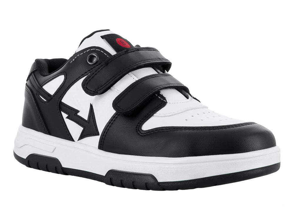 Tenis infantiles de color blanco y negro con cierre de velcro.