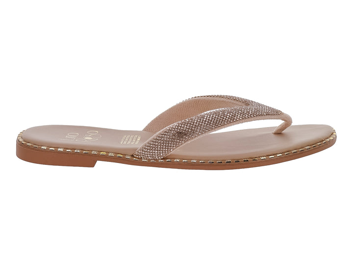 Sandalias planas color oro rosado con tira ancha decorada con brillantes.
