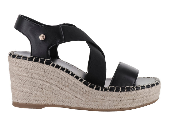 Sandalia de cuña color negro con plataforma de yute beige y correa al tobillo.
