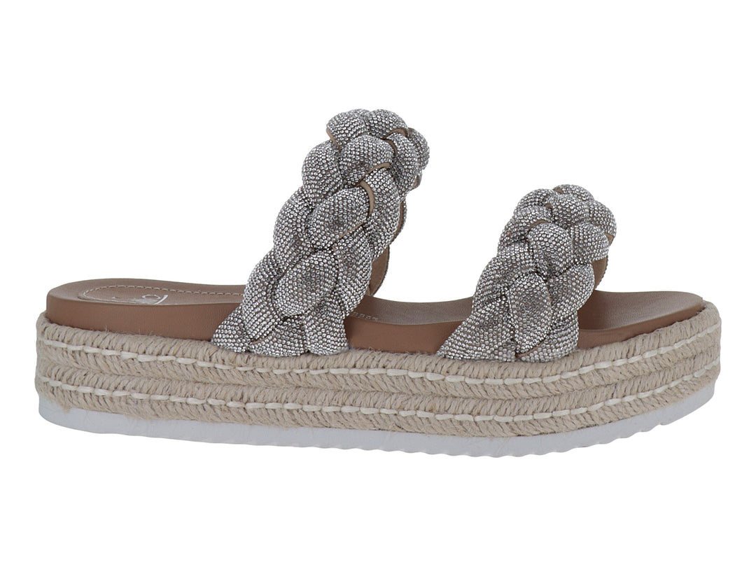 Sandalias plateadas para mujer con tiras trenzadas brillantes y plataforma de estilo espadrille en color beige.