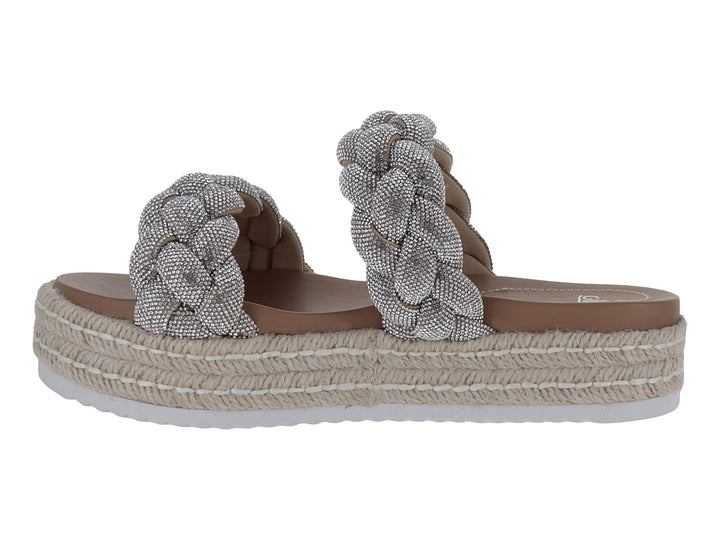 Sandalias plateadas para mujer con tiras trenzadas brillantes y plataforma de estilo espadrille en color beige.